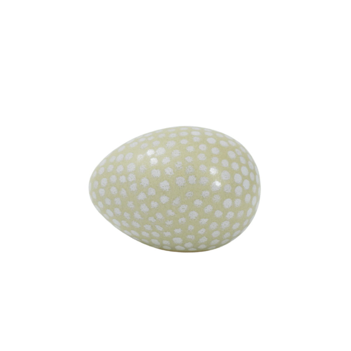 Ägg i keramik med pärongrön basfärg och vita handmålade prickar